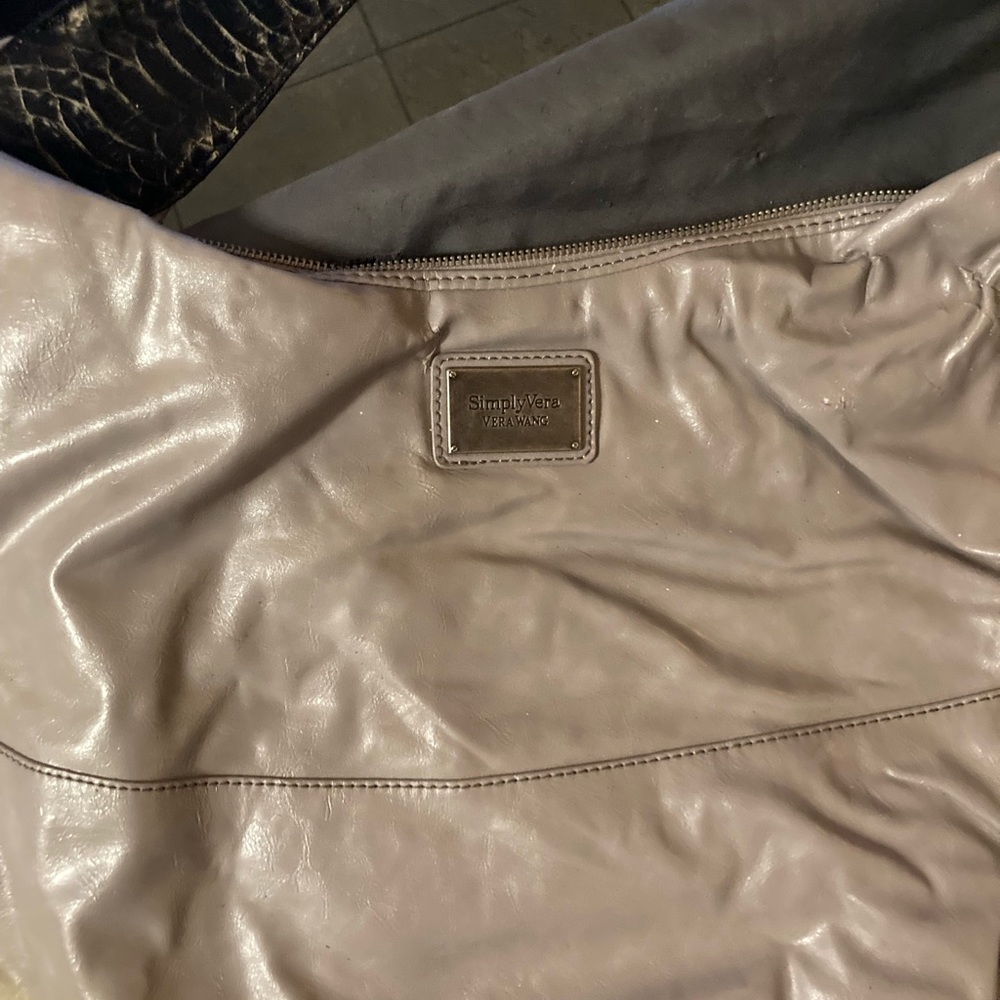 Woman’s purses from Michael kors to Vera wang